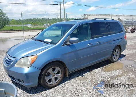 2010 Honda Odyssey Touring z USA, uszkodzony, nr VIN 5FNRL3H93AB058240